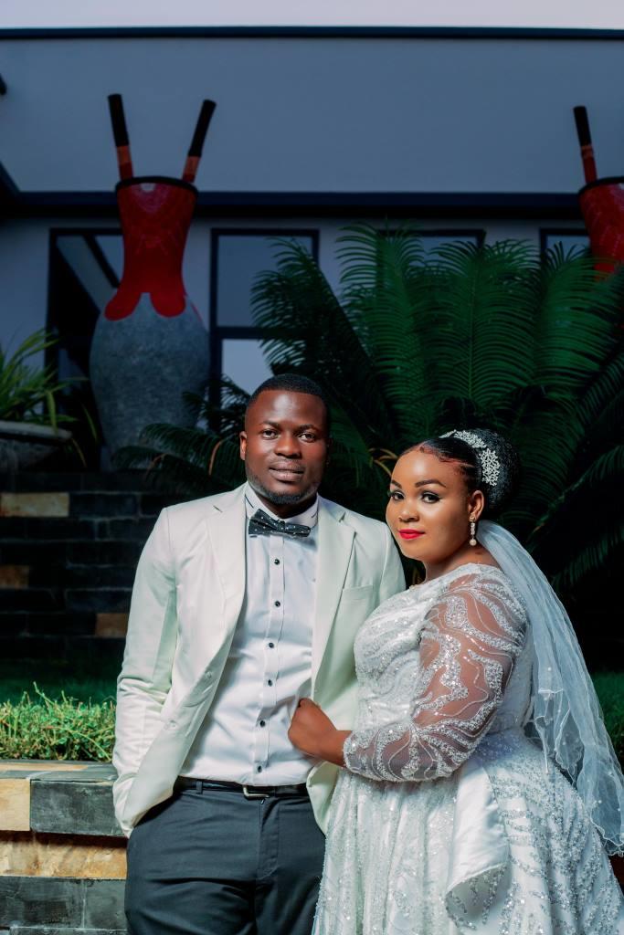 Bride and groom sharing a golden sunset moment during a wedding photoshoot in Benin City, Nigeria.